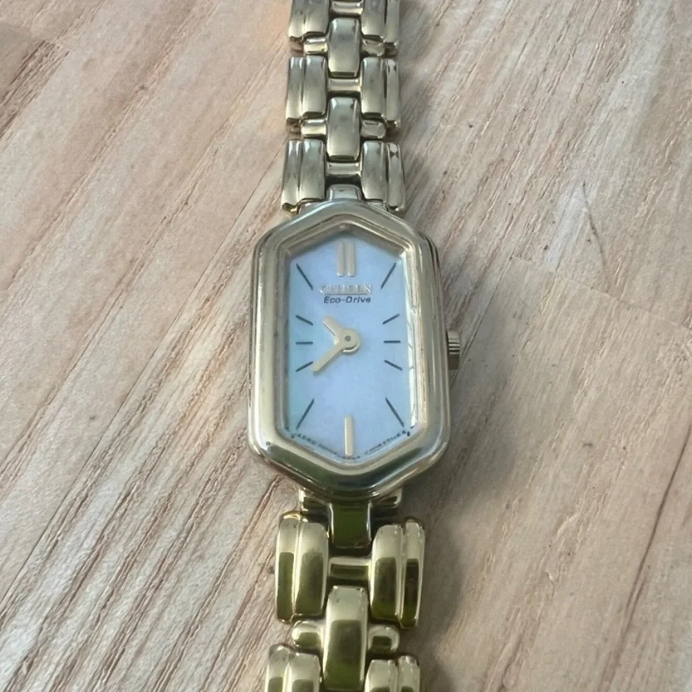 Citizen eco drive ladies gold tone hexagonal bracelet watch